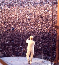 David Bowie on Stage with Red Roses - Serious Moon