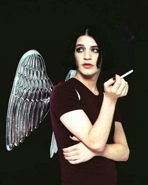 Brian Molko queer icon androgynous fashion style