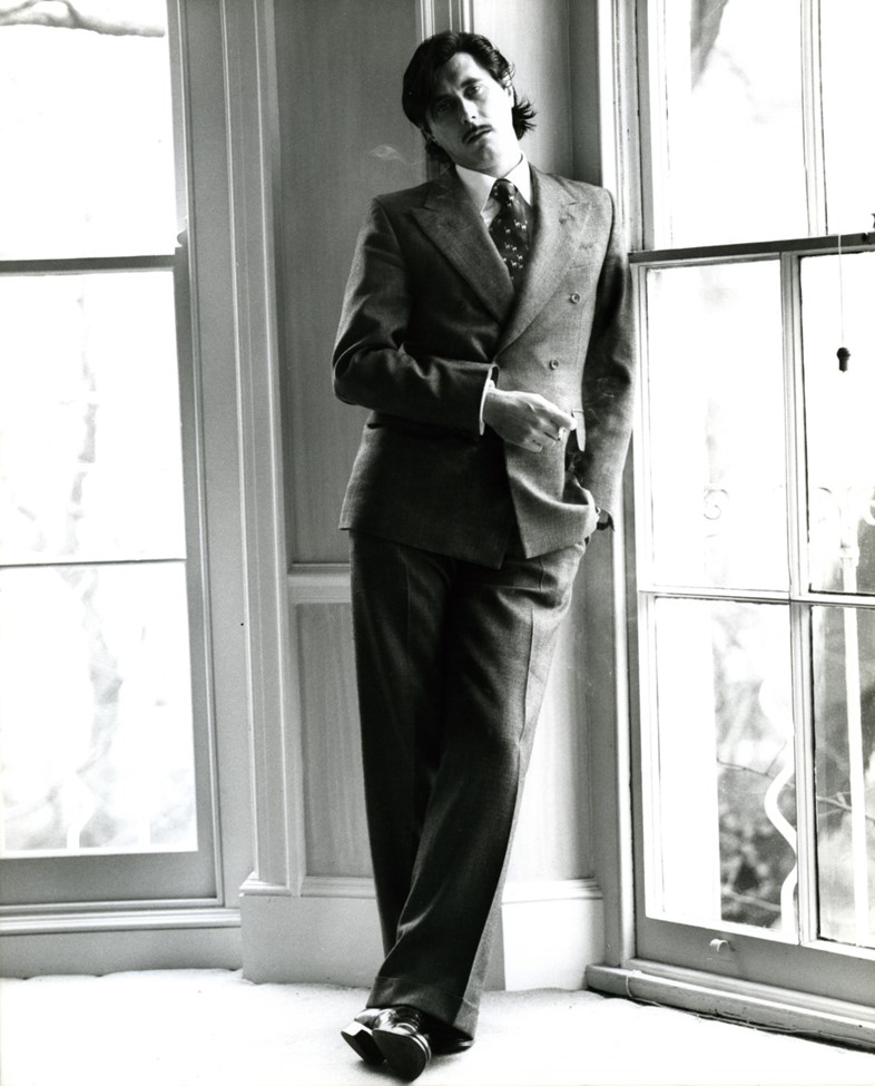 BF with moustache standing by window; 1976 [1]